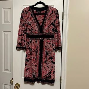 INC international concept paisley red, black mixed with other vibrant colors.